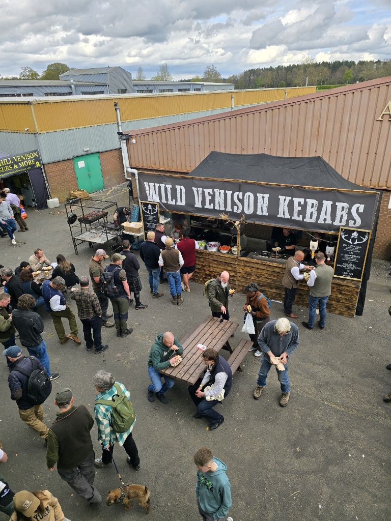 Aerial view of Wild Venison Kebabs stand with long queue
